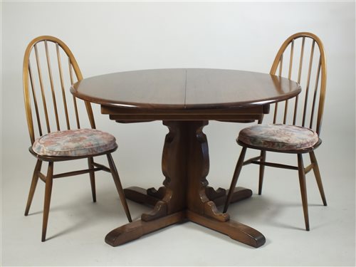 Lot 413 - A set of six (4+2) 1980s Ercol beech framed hoop and stick back chairs (6)