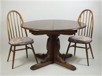 Lot 413 - A set of six (4+2) 1980s Ercol beech framed hoop and stick back chairs (6)