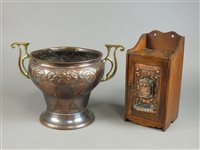 Lot 303 - An art nouveau copper mounted wall hanging tobacco cabinet