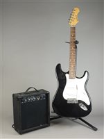 Lot 255 - An Elevation six string electric guitar and stand