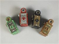 Lot 315 - Box containing four Bakelite Coronet Midget cameras