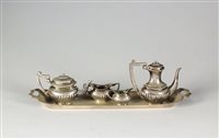 Lot 63 - A silver miniature tea service