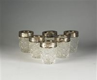 Lot 74 - Six silver mounted tot glasses