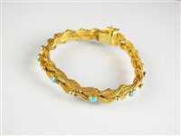 Lot 244 - A yellow metal stone set bracelet