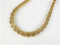 Lot 195 - A yellow metal necklace