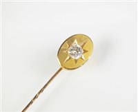 Lot 223 - A diamond stick pin