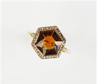 Lot 149 - A hexagonal  citrine and diamond dress ring