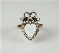 Lot 249 - An opal and diamond heart ring