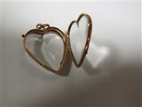 Lot 89 - Three memorial lockets/pendants