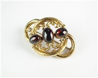 Lot 96 - A garnet set brooch