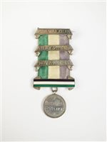 Lot 323 - A silver hunger strike suffragette medal