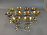 Lot 171 - Set of ten glass goblets with gilt detail