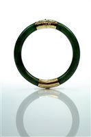 Lot 87 - A Chinese Nephrite Jade and Gold Bangle
