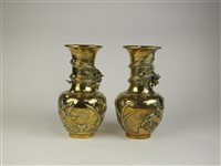 Lot 134 - A pair of Chinese brass vases