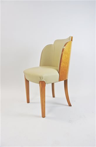 Lot 345 - An Art Deco birds eye cloud back maple desk chair