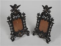 Lot 426 - A pair of Victorian classical revival cast metal photograph frames