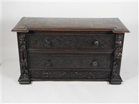 Lot 433 - A Victorian carved oak chest, in Renaissance Revival style