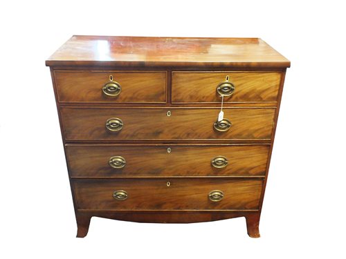 Lot 520 - A Regency mahogany chest of two short and three long graduated cockbeaded drawers