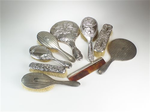 Lot 24 - A collection of silver mounted dressing table wares