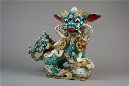 Lot 7 - A Large Chinese Glazed Stoneware Figure of a Guardian Lion