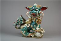 Lot 7 - A Large Chinese Glazed Stoneware Figure of a Guardian Lion