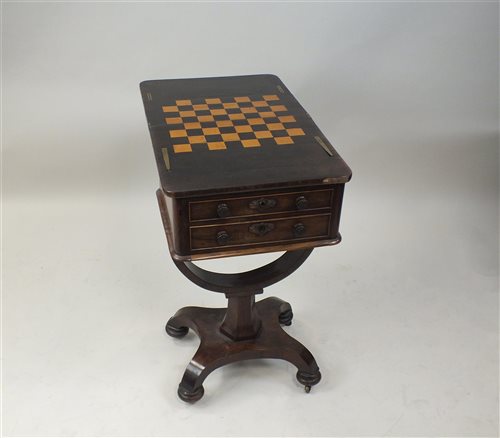 Lot 523 - An early Victorian rosewood combined games and work table