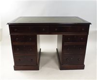 Lot 483 - An Edwardian mahogany pedestal desk