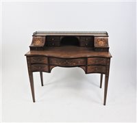 Lot 632 - An Edwardian and mahogany inlaid desk