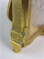 Lot 526 - A mid-19th century gilt brass strut timepiece