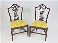 Lot 634 - A set of 6 Georgian III mahogany camel back dining chairs