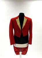 Lot 423 - Two gentlemen's hunting tailcoats, red and black, with monogrammed buttons