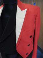 Lot 423 - Two gentlemen's hunting tailcoats, red and black, with monogrammed buttons