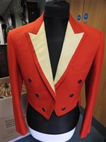 Lot 423 - Two gentlemen's hunting tailcoats, red and black, with monogrammed buttons
