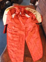 Lot 423 - Two gentlemen's hunting tailcoats, red and black, with monogrammed buttons