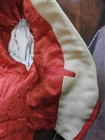 Lot 423 - Two gentlemen's hunting tailcoats, red and black, with monogrammed buttons