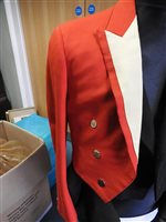 Lot 423 - Two gentlemen's hunting tailcoats, red and black, with monogrammed buttons