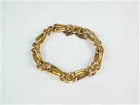 Lot 55 - A yellow metal bracelet