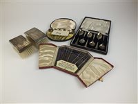 Lot 82 - A cased set of silver miniature swords