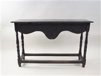 Lot 467 - A carved oak side table, 17th century and later