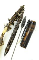 Lot 621 - An African quiver, shaker stick and a spear