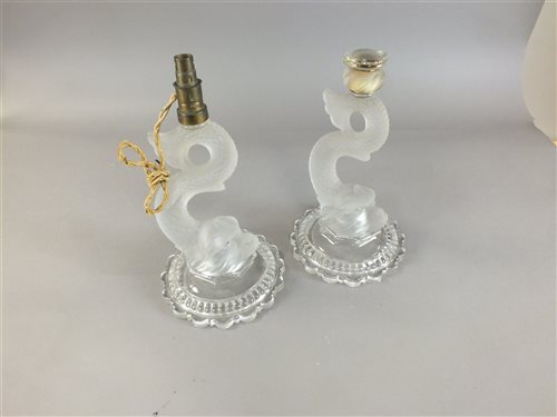 Lot 208 - A pair of French glass candlesticks attributed to Baccarat