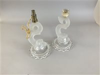 Lot 208 - A pair of French glass candlesticks attributed to Baccarat