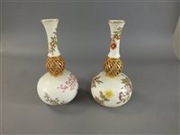 Lot 219 - A pair of Royal Worcester blush ivory and reticulated vases