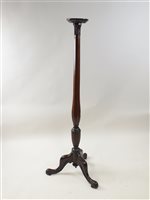 Lot 465 - A 19th century mahogany and boxwood strung torchere stand