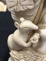 Lot 151 - A large Indian carved ivory figure of Ganesh