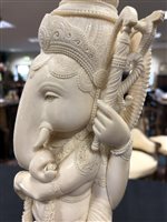Lot 151 - A large Indian carved ivory figure of Ganesh