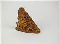 Lot 108 - A small Indian carved ivory relief of Ganesh
