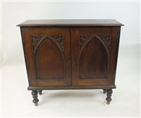 Lot 481 - A crossbanded oak side cabinet in Victorian gothic style