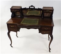 Lot 487 - A Louis XV style mahogany bonheur du jour