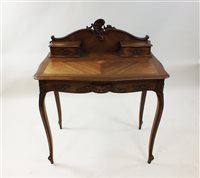 Lot 505 - A Louis XV style quarter veneered walnut bureau